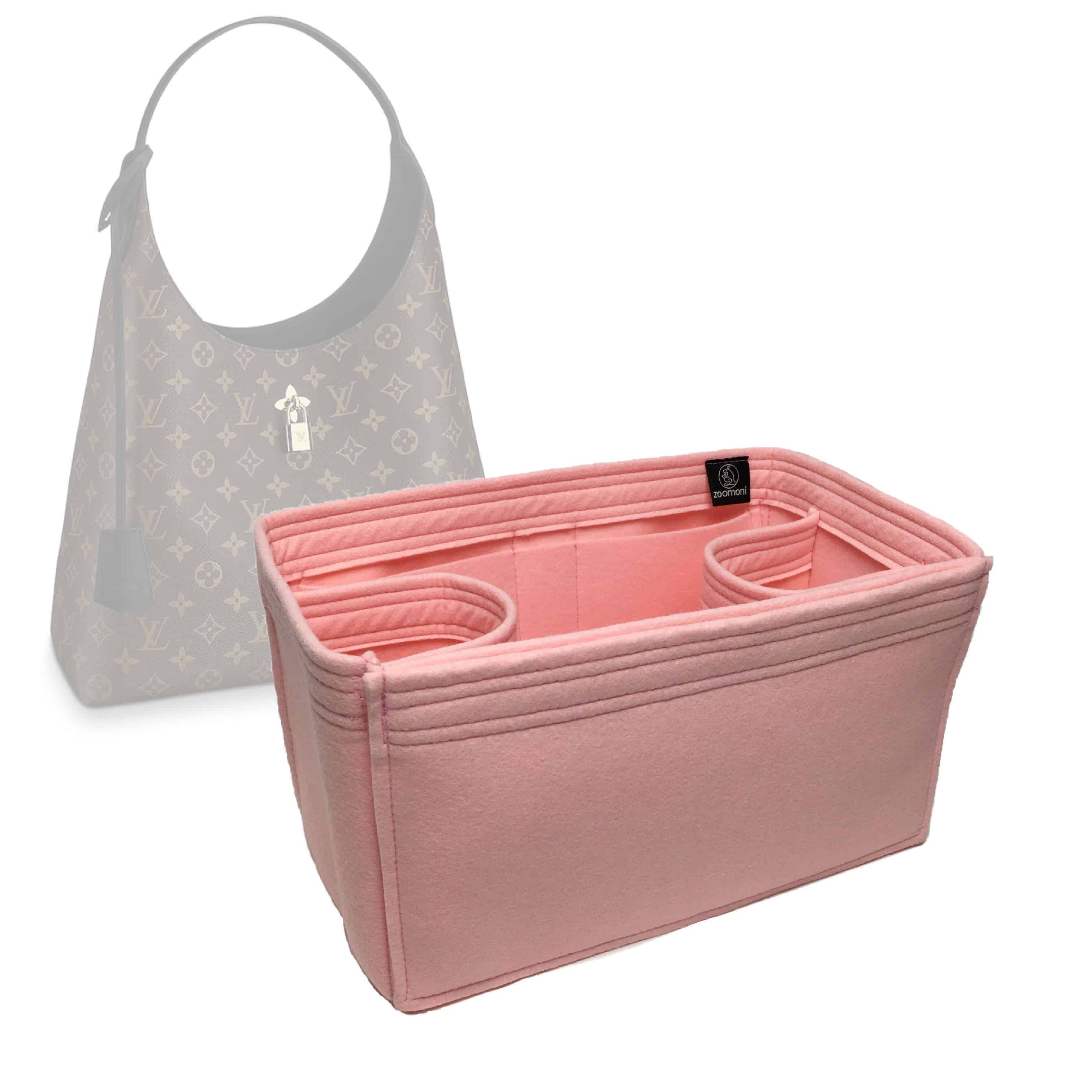 I am in love with my pink luggage set and my Louis Vuitton Artsy MM