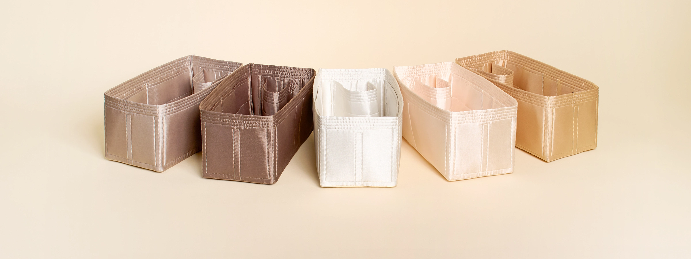 New Home Handcrafted with premium felt and silky satin materials, each piece is made with care to protect, support, and last with the bags you love.