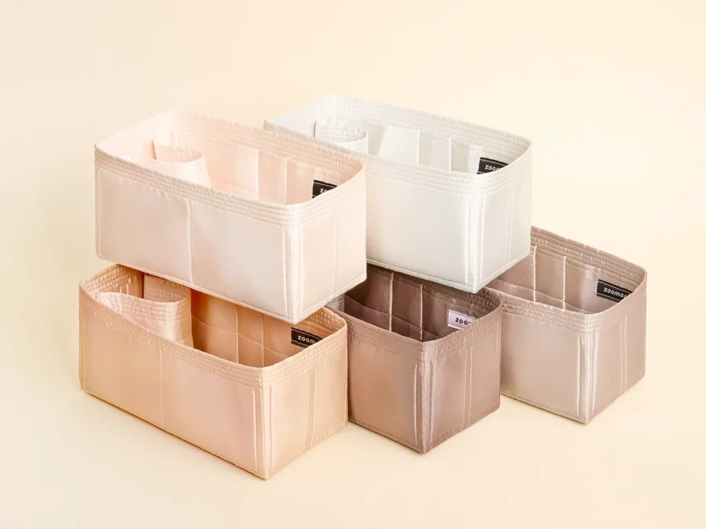 New Home Handcrafted with premium felt and silky satin materials, each piece is made with care to protect, support, and last with the bags you love.